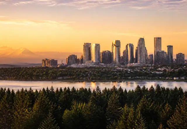 Bellevue skyline at golden hour across Lake Washington